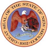 New Mexico's first seal was designed shortly after the organization of the Territorial Government, in 1851.  The original seal has long since disappeared, possibly as part of the artifacts placed into the cornerstone of the Soldiers Monument in the Santa Fe Plaza.  Imprints of the original seal show it consisted of the American Eagle, clutching an olive branch in one talon, and three arrows in the other.  Along the outside rim was the inscription "Great Seal of the Territory NM." 

In the early 1860's an unknown official adopted a new seal, using a design similar to today's Great Seal.  It featured the American Bald Eagle, its outstretched wings shielding a smaller Mexican Eagle, symbolizing the change of sovereignty from Mexico to the United States in 1846.  The smaller Mexican Brown, or Harpy, Eagle grasped a snake in its beak and cactus in its talons, portraying an ancient Aztec myth.  The outside rim of the seal contained the words "Territory of New Mexico," with the date of 1850 along the bottom in Roman numerals (MDCCCL). 

It is not clear when the Latin phrase "Crescit Eundo" was added to the seal, but in 1882, Territorial Secretary W.G. Ritch embellished the earlier design with the phrase, which translates as "it grows as it goes".  This version of the seal was adopted as New Mexico's "official seal and coat of arms" by the Territorial Legislature in 1887. 

When New Mexico became a state in 1912, the Legislature named a Commission for the purpose of designing a State Seal.  In the meantime, the Legislature authorized interim use of the Territorial Seal with the words "Great Seal of the State of New Mexico" substituted.  In June 1913, the Commission, which consisted of Governor William C. McDonald, Attorney General Frank W. Clancy, Chief Justice Clarence J. Roberts, and Secretary of State Antonio Lucero, filed its report adopting the general design of the Territorial Seal, substituting only the date 1912 for the Roman numerals.  That seal is still in use today as the official seal of New Mexico. 
